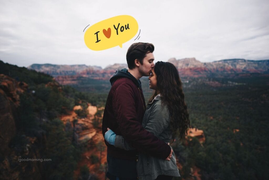 forehead kiss images girl to boy at hill background