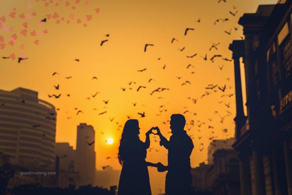 A romantic pose for a couple watching a sunrise