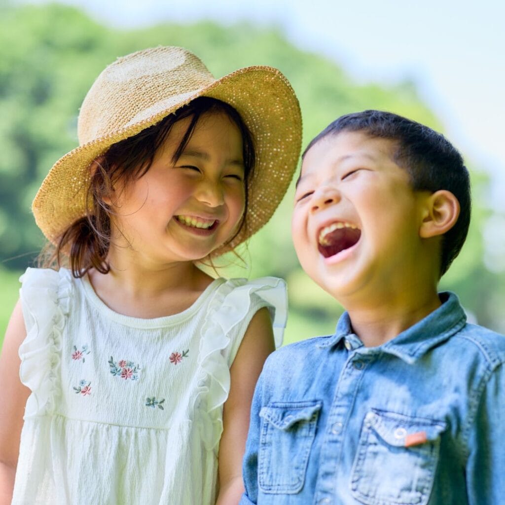 two cute boy and girl smile